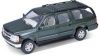 Игрушка модель машины 1:24 2001 CHEVROLET SUBURBAN.